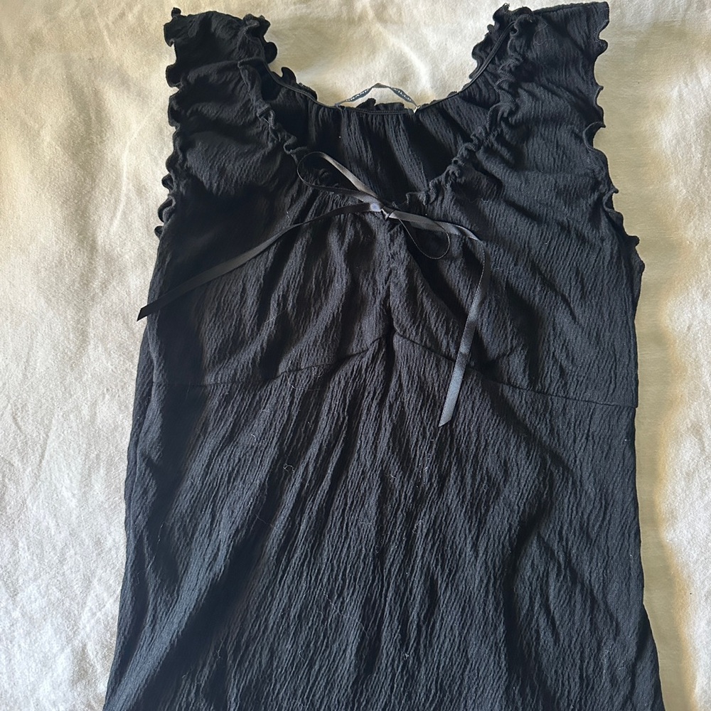 Black Ruffled Sleeveless Top